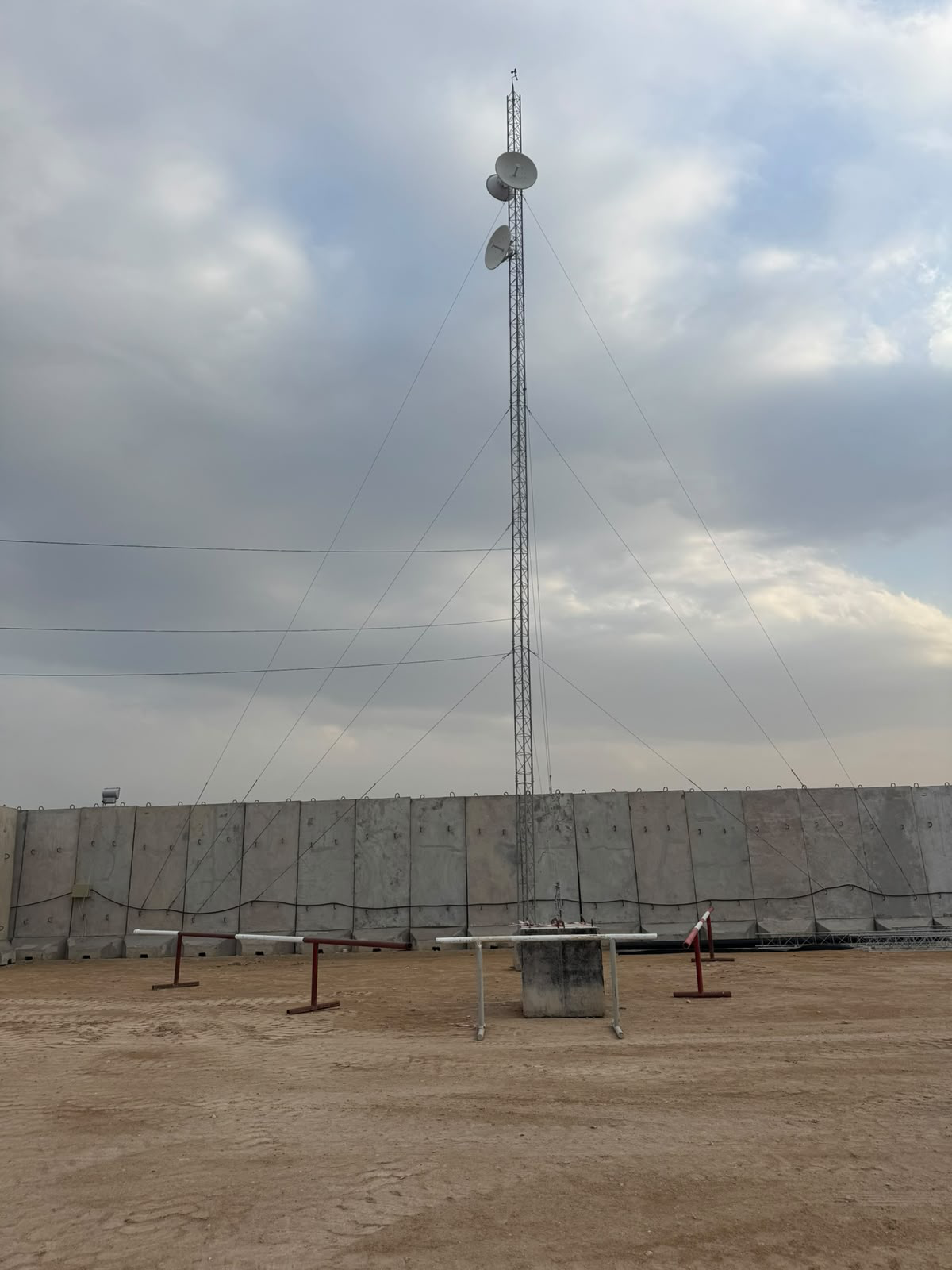 Completed microwave backhaul tower at an industrial site
