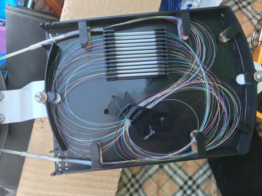 Fiber optic distribution and splicing tray