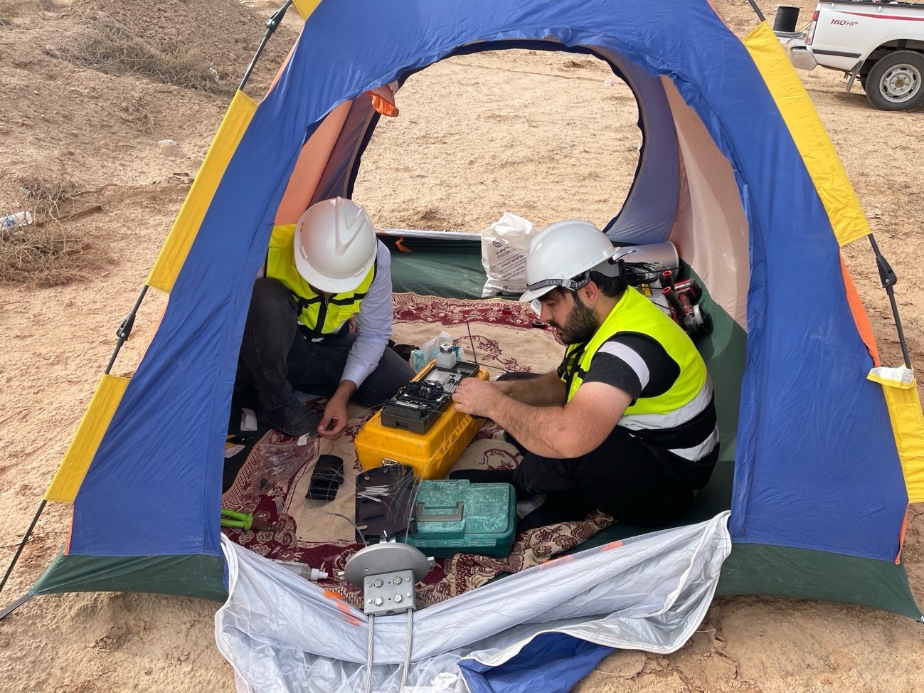 IQSTS field team splicing fiber optic cables