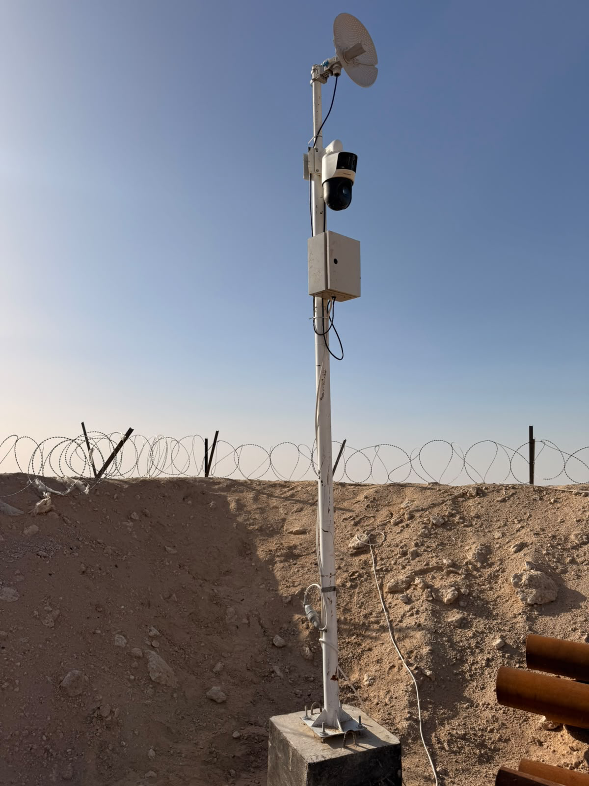 Remote surveillance camera and wireless backhaul node