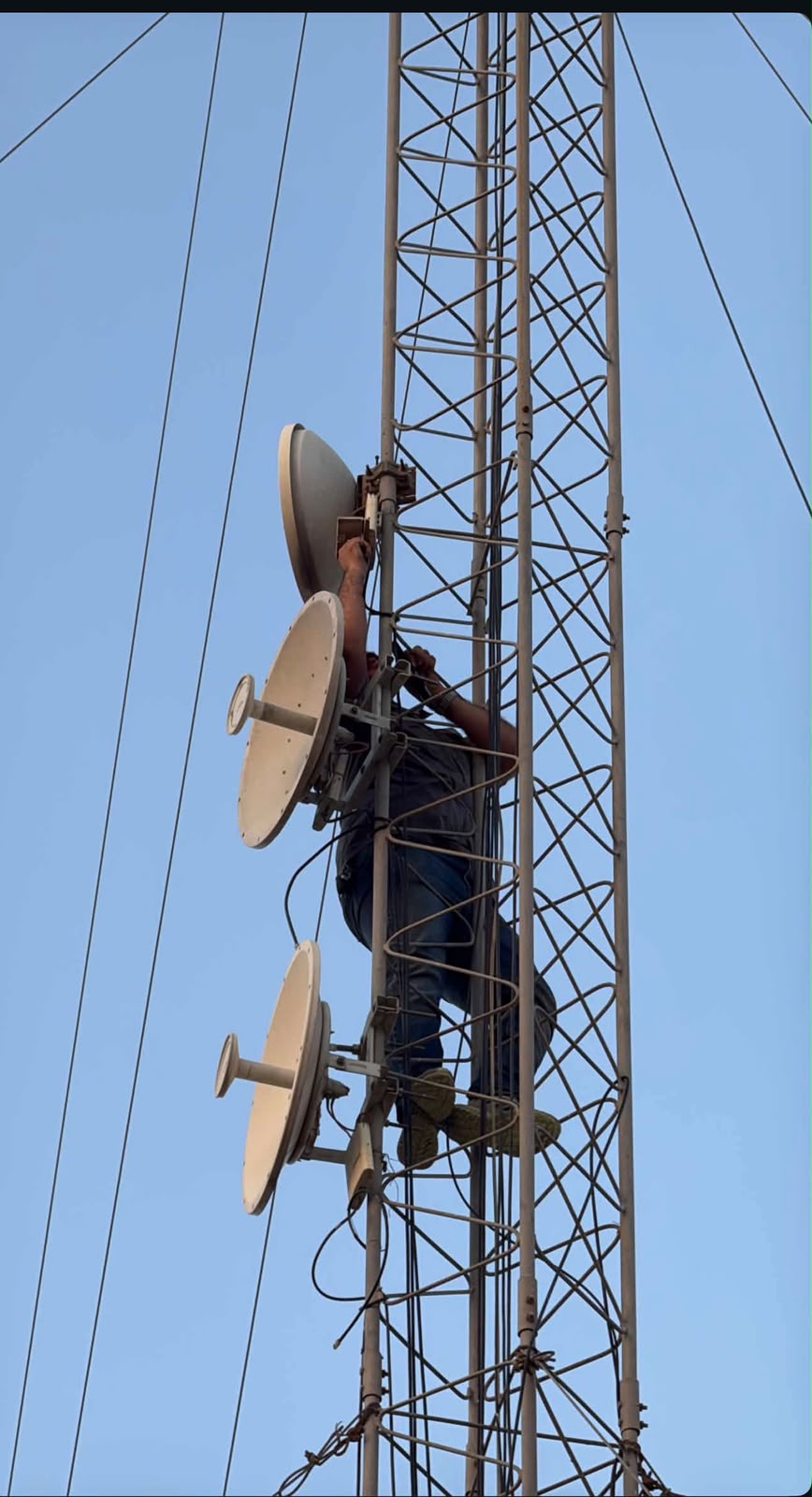 Radio link equipment installation on a communications tower